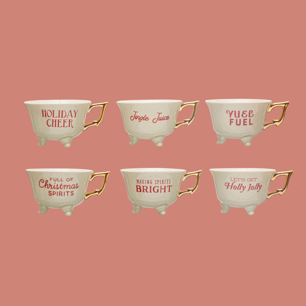 https://harleylilac.com/cdn/shop/files/creative-co-op-stoneware-footed-cup-with-holiday-saying-and-gold-electroplating_1024x1024.jpg?v=1692214146